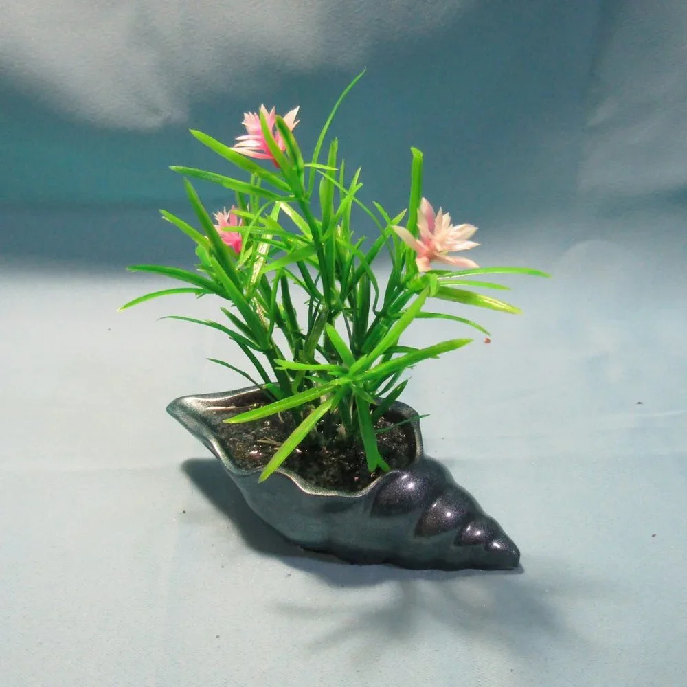 Aquarium Decoration -Teal Blue Long Shell with Flowering Plant.